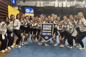 Eastchester cheerleaders celebrate their performance at the Regional event at Iona University on Dec. 14.